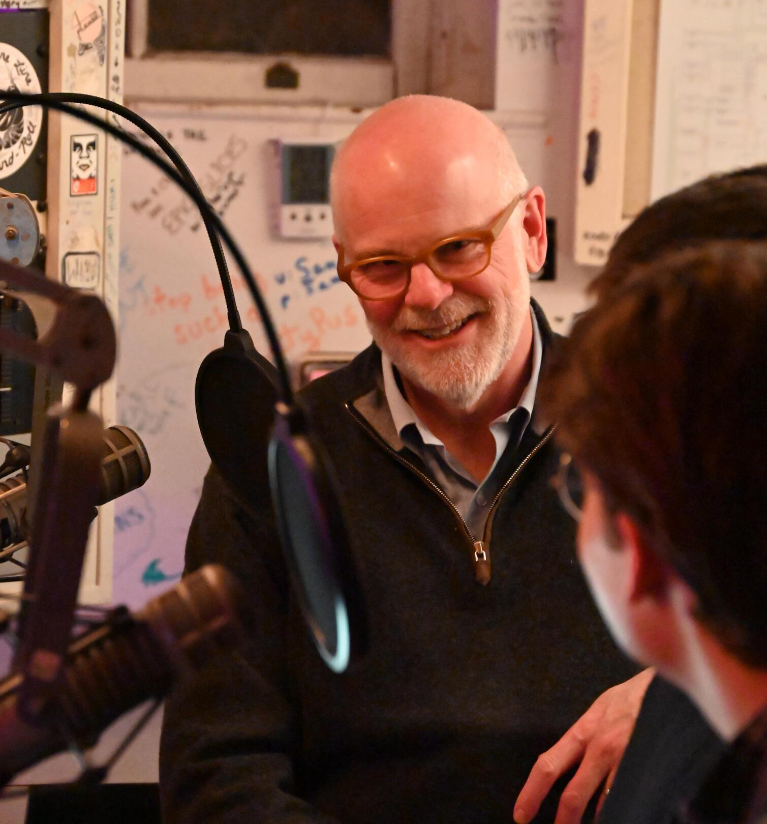 Bowdoin College President Clayton Rose looking at student interviewers